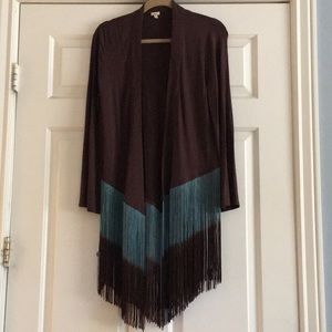 Brown sweater with teal tassels